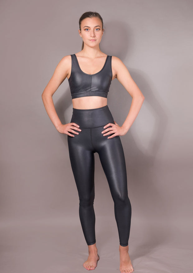 High-rise liquid leggings in black. YUCO's best-seller - the high-rise full-length liquid leggings in black. Cut from our premium liquid fabric, this luxe performance piece is designed for yoga, gym training, running, cycling and everyday wear. We offer THE BEST PRICE on the market.